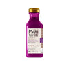 Purple shampoo bottle with gold cap on a white background