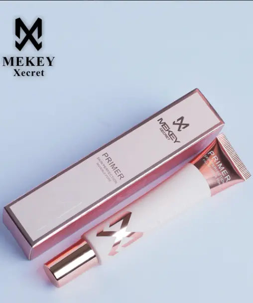 Mekey Xecert Face Primer in rose gold tube with packaging box on light backgroundMekey Xecert Face Primer in rose gold tube with packaging box on light background