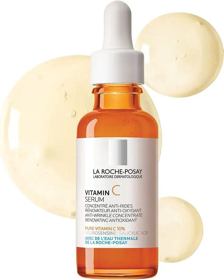 La Roche-Posay Vitamin C Serum bottle with dropper, surrounded by serum drops, showing anti-wrinkle and antioxidant properties.