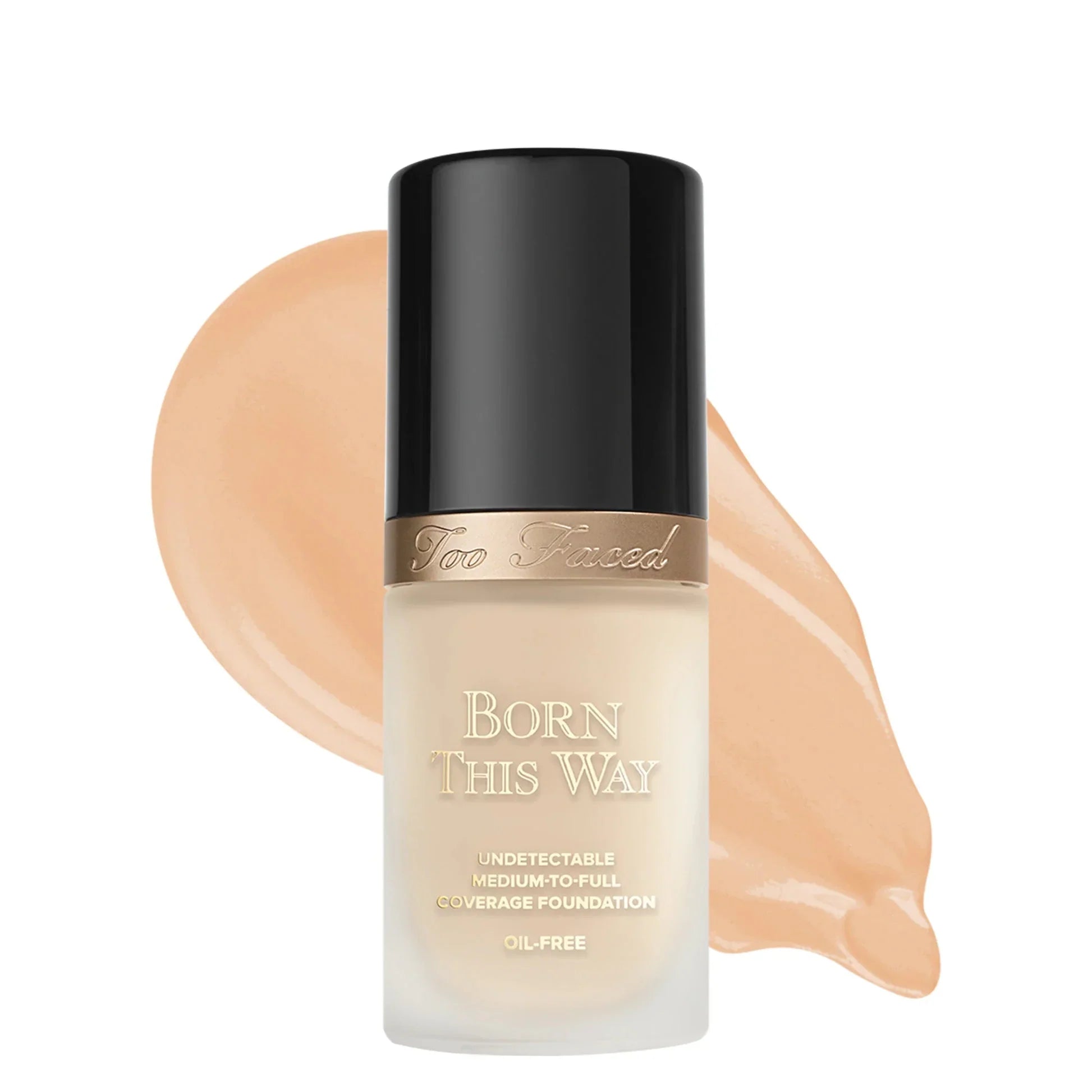 Too Faced Born This Way oil-free foundation bottle with medium-to-full coverage formula and beige shade swatch background on a clean white backdrop