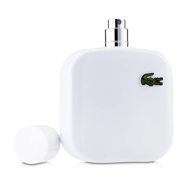 White Lacoste perfume bottle with silver cap on a white background