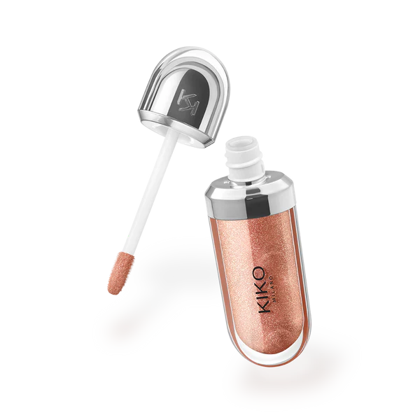 Rose gold lip gloss with applicator on a white background