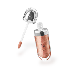 Rose gold lip gloss with applicator on a white background